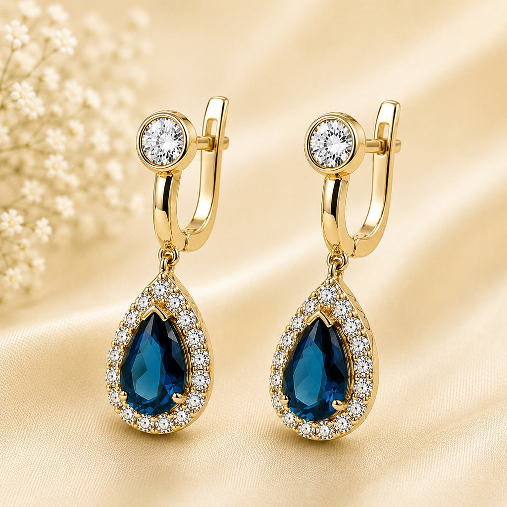 Серьги из голубого топаза и муассанита, позолоченное серебро 925 пробы (14K)