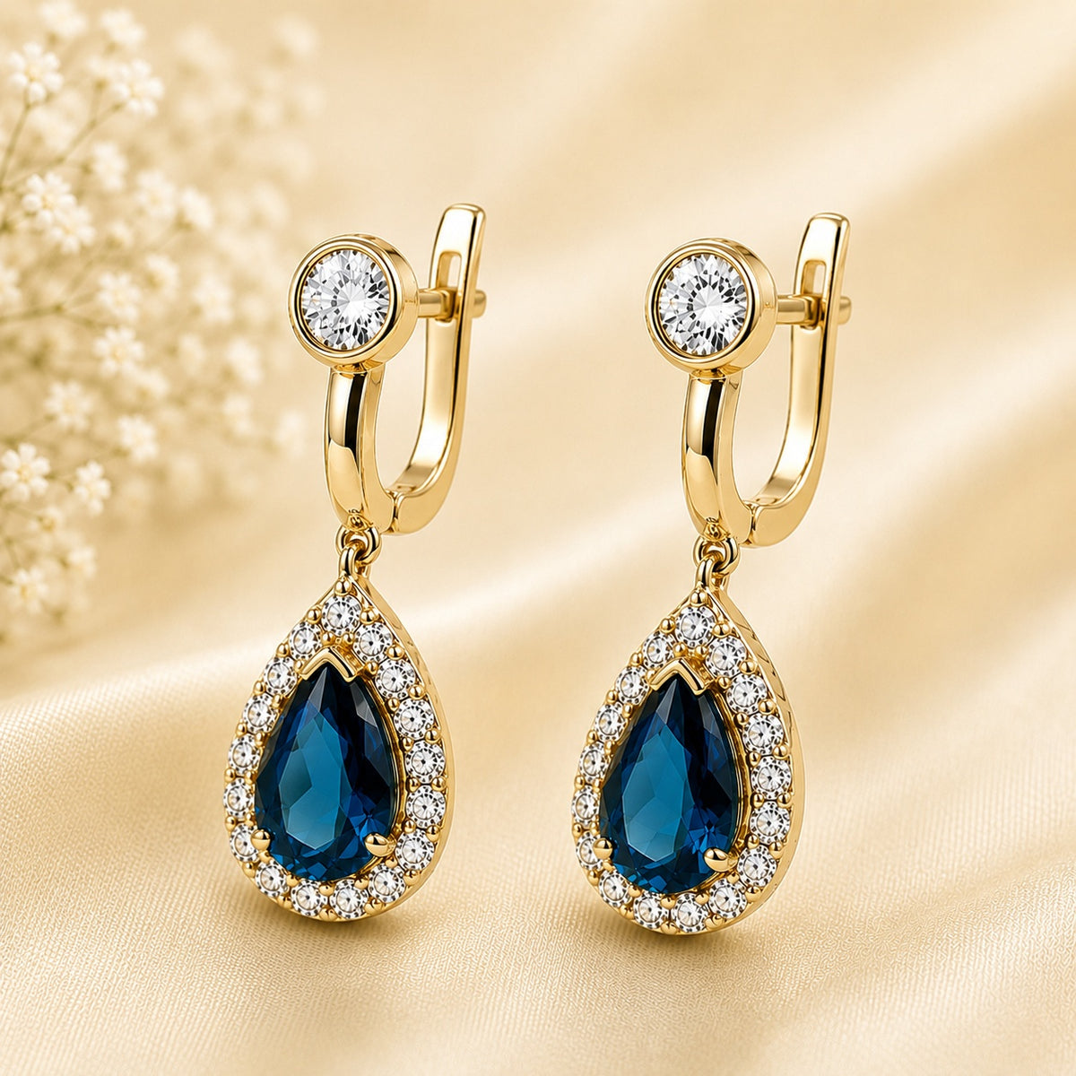 Серьги из голубого топаза и муассанита, позолоченное серебро 925 пробы (14K)